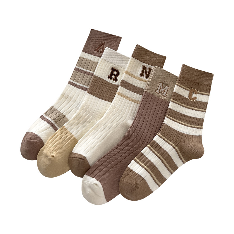 Calcetines de algodón de color sólido calcetines de invierno niñas ins moda Zhuji calcetines a media pierna bordados a rayas con doble aguja