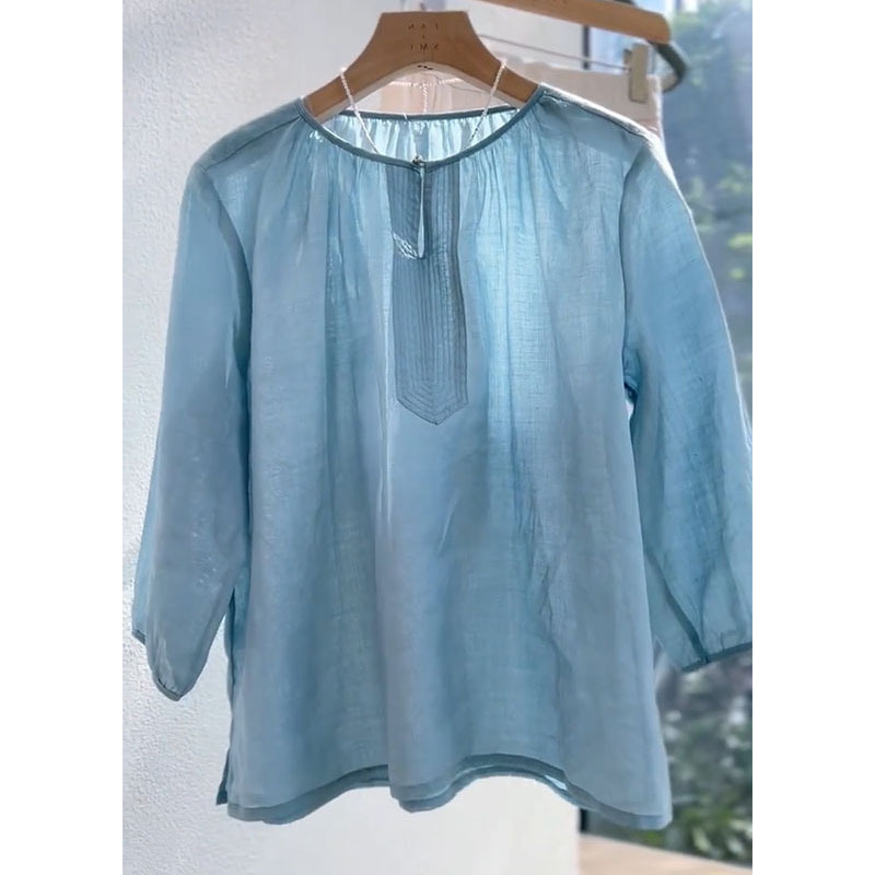 Elegant blue summer thin shirt with a round collar