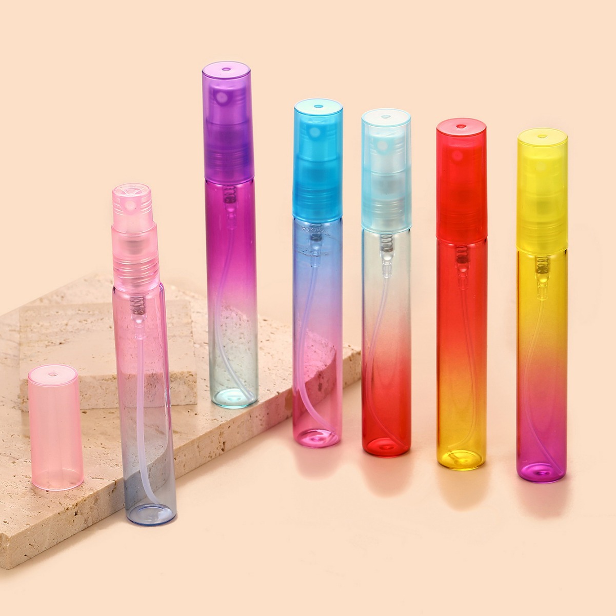 Botella de spray de vidrio delgado de 8ml con cabezal de bomba de presión Botella de tubo de tracción del arco iris Botella de subenvasada de cosméticos líquidos pequeños y portátiles