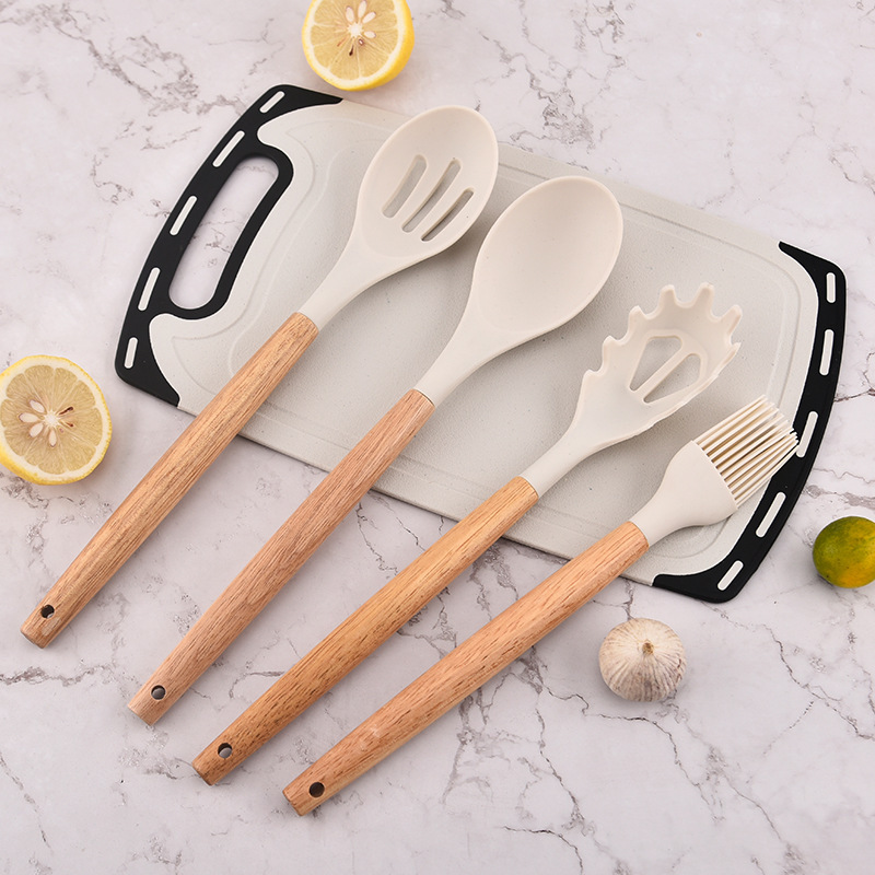 Nuevos productos 19 piezas de fábrica de cocina de silicona venta directa placa adhesiva octogonal doble mango de madera 19 piezas de conjunto de herramientas de corte