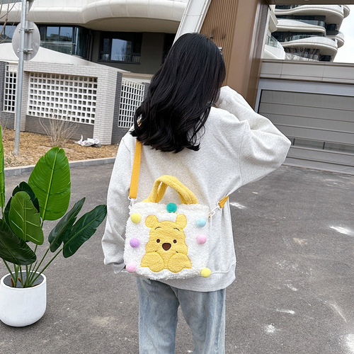 Japanese-style new children's fuzzy ball Winnie the Pooh SpongeBob single-shoulder cross-body bag cartoon toy figure bag wholesale