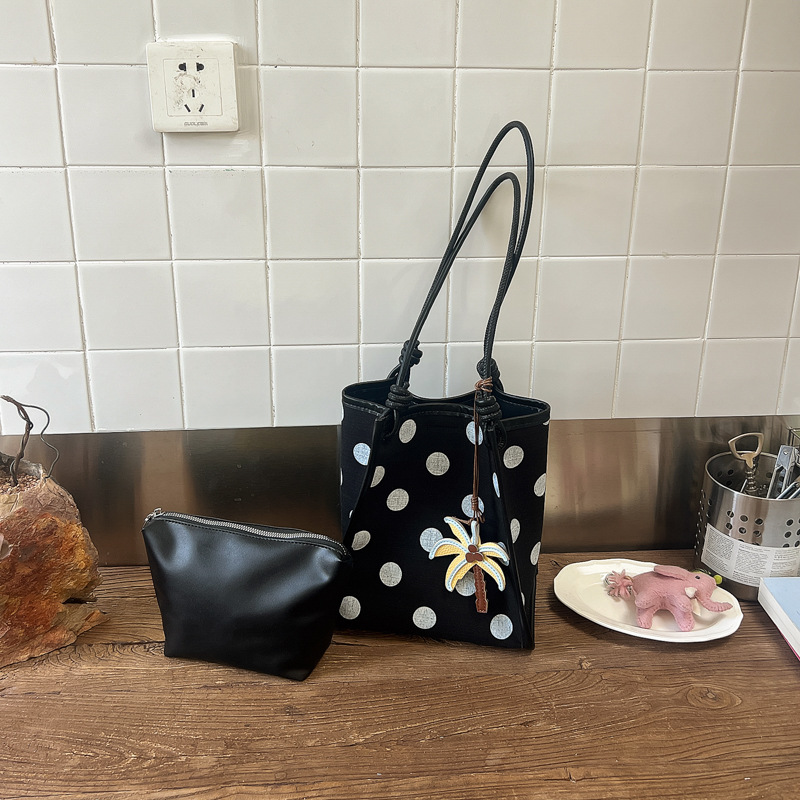 Bolsa de punto de onda de gran capacidad para mujeres 2026 verano nuevo ocio simple hombro brazo bolso de viaje al trabajo bolsa de mano