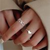 Adjustable brand fashionable ring, Japanese and Korean, on index finger