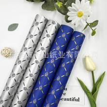 工厂批发木浆牛皮纸30-70克单光白牛皮纸印刷图案LOGO精美包装纸