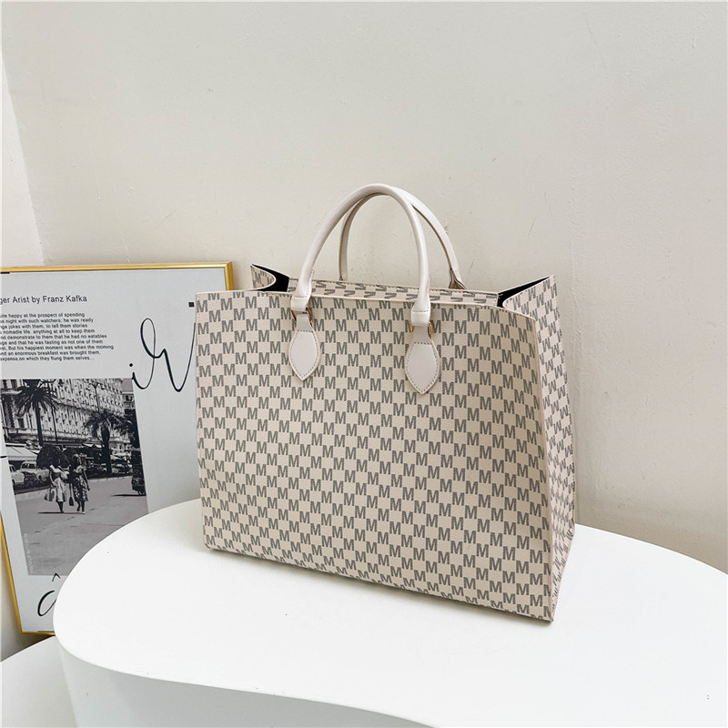 2024 nueva moda simple de gran capacidad impresión retro bolso de mano letras de marea portátil bolsa de mujer de viaje