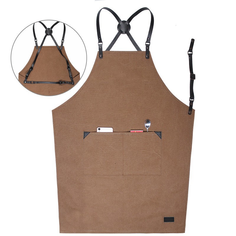 Comercio exterior delantal de lona gruesa peluquería cafetería panadería ropa de trabajo PU cuero correa ajustable delantal al por mayor