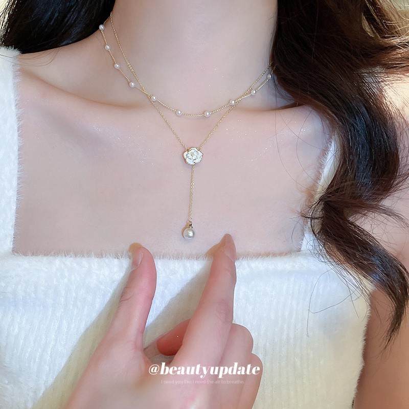 Collar de perlas con lazo de flor con cuentas francesas Elegante cadena de clavícula con sentido de alta gama retro ligero decoración de lujo femenino