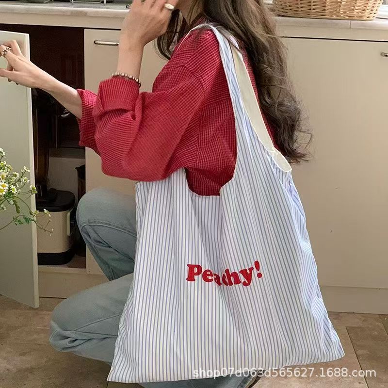 2025 春夏の新韓国 ins レターストライププリントバッグ軽量シンプルな絶妙なポータブルショルダーバッグ女性のための|undefined