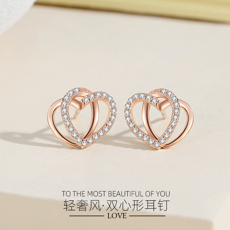 Pendientes de plata 925 pendientes de doble circón en forma de corazón para las mujeres Luz de lujo estilo nicho ins corazón a corazón imprimir joyería de alta calidad para las mujeres