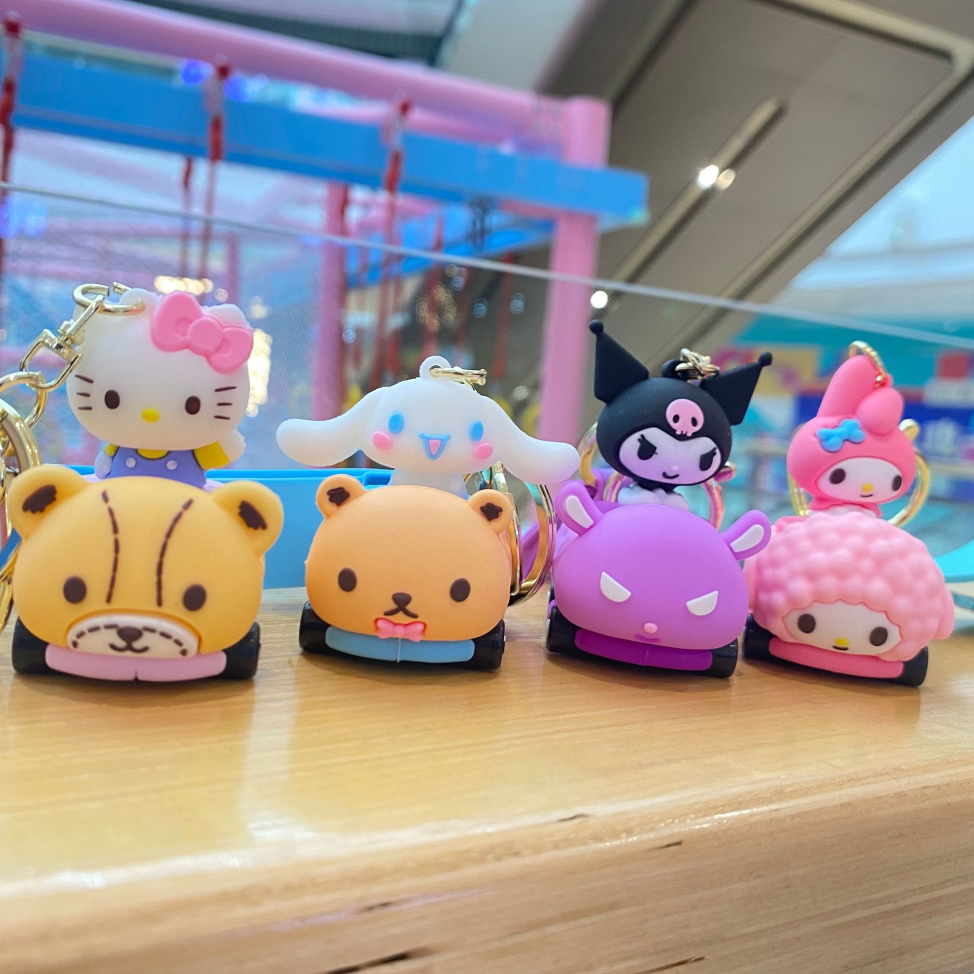De dibujos animados Sanrio drag little driver muñeca llavero colgante cuatro estrellas coolomi bolsa de accesorios al por mayor