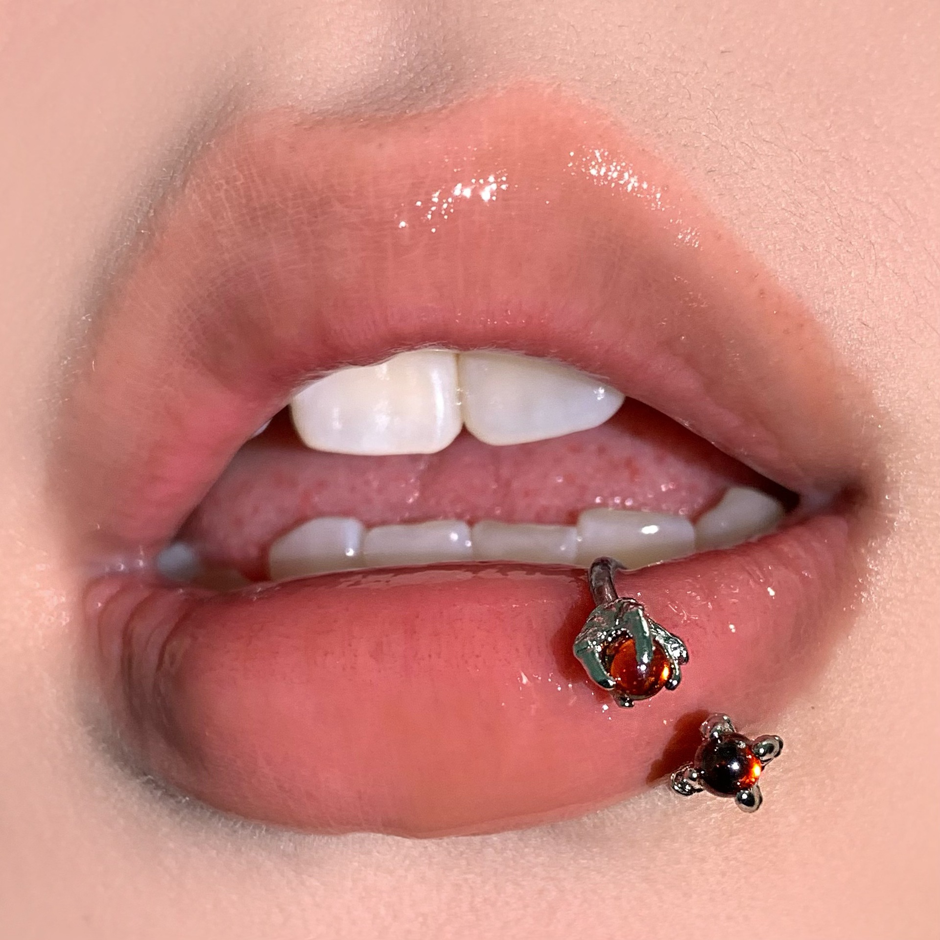 Silver pointed spike labret stud material detail