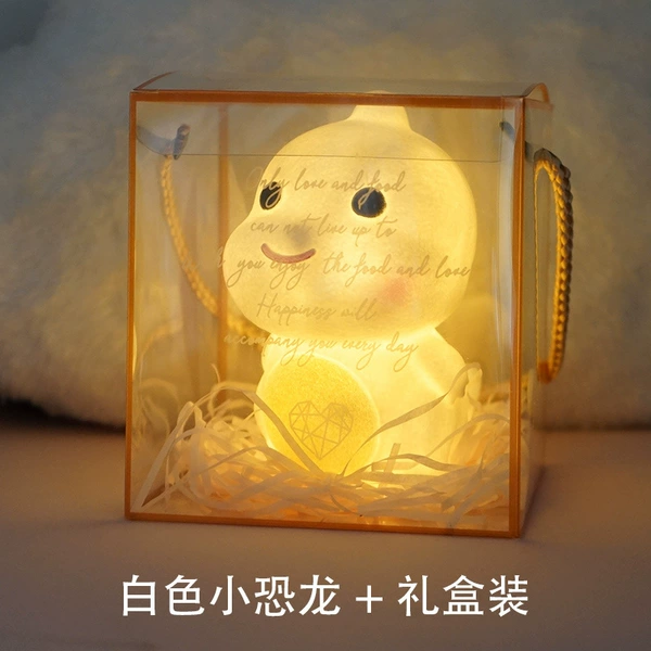 White dinosaur, gift box