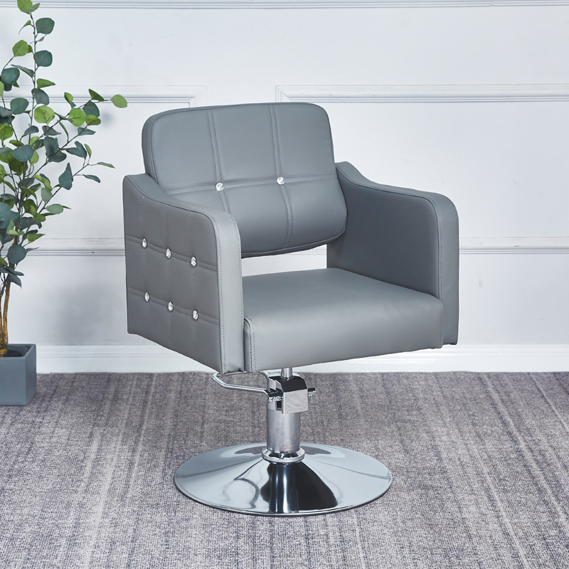 Fabricantes de sillas de peluquería al por mayor silla de cuero retro de alta gama de estilo europeo silla de peluquería minimalista moderna silla de corte de peluquería