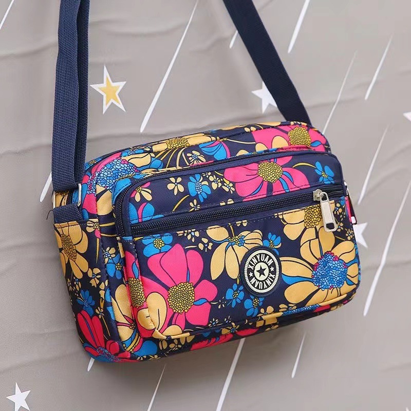 Bolsa de tela de flores bolsa de mensajero de las mujeres nueva bolsa de Madre de gran capacidad bolsa de hombro individual de mediana edad y ancianos bolsa de tela Oxford bolsa