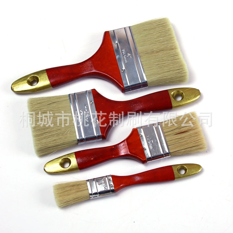 Источник фабрики с красной деревянной ручкой с золотой щетиной