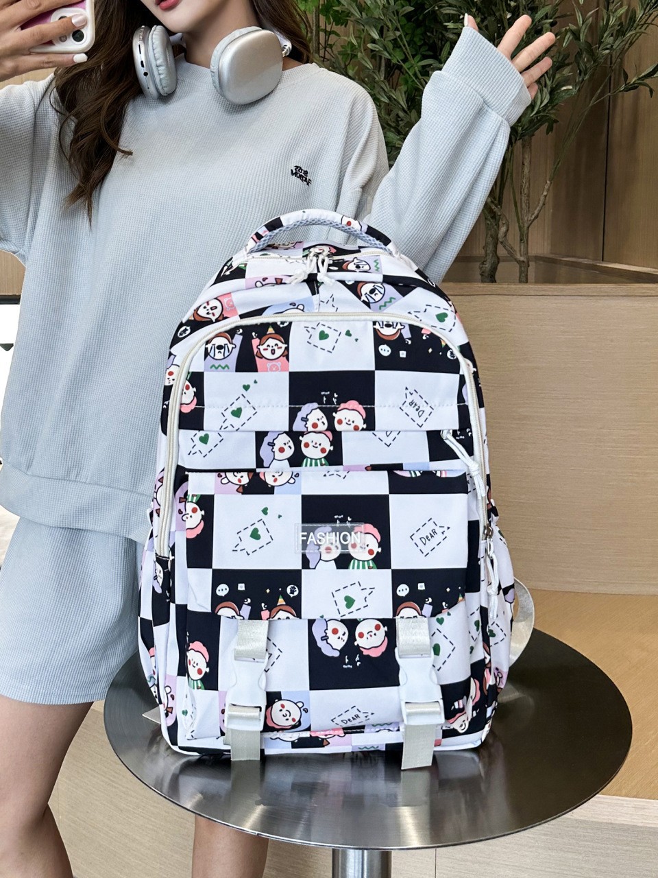 Estudiantes de secundaria y secundaria, mochila de computadora de tendencia ligera, mochila coreana de viaje transfronterizo de gran capacidad.