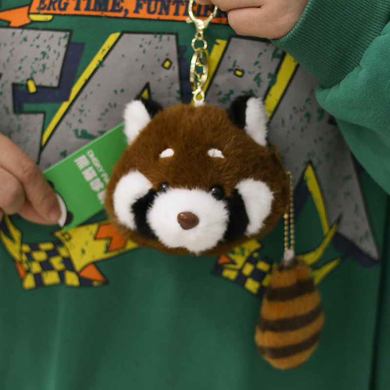 Genuine tail hanging black and white panda flower coin purse mobile phone bag red panda pendant Chengdu base with cute