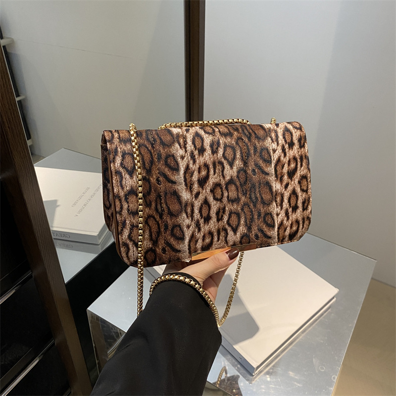 Bolsos de textura de leopardo de alta calidad para mujeres 2024 nueva moda bolso de cadena de hombro para mujeres ins zwang nicho bolso de mochila universal