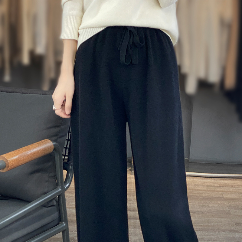 ウールのズボンの女性の秋冬の新型の純色の自然な腰のメリヤスは厚い広腿のズボンのカジュアルな垂感を厚くします。