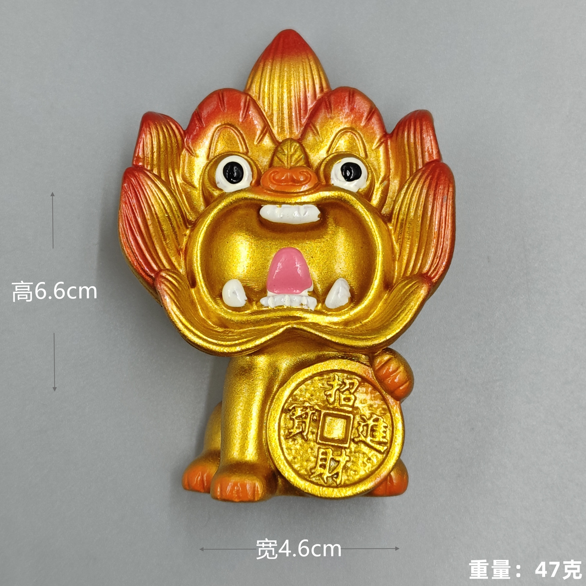 El nuevo oro (un moneda de cobre) el gato (un moneda de cobre pegado en el refrigerador)