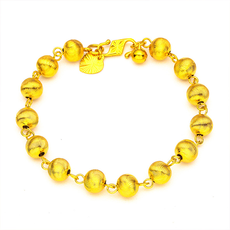 Pulsera unisex de moda con diseño de ojo de gato en oro y arena_voghion.com