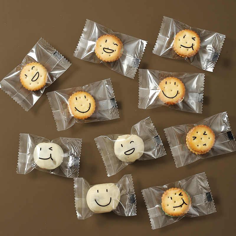Botón de dibujos animados grueso galletas bolsas transparentes tortilla de nieve nougat horneado galletas de leche datilla sellado mini embalaje