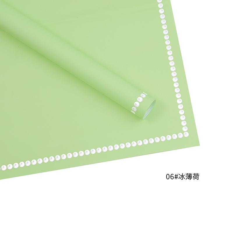 Huaxi fábrica de perlas de palma al por mayor de papel elegante puntos alrededor del borde impermeable perla envoltura material de embalaje de flores de papel