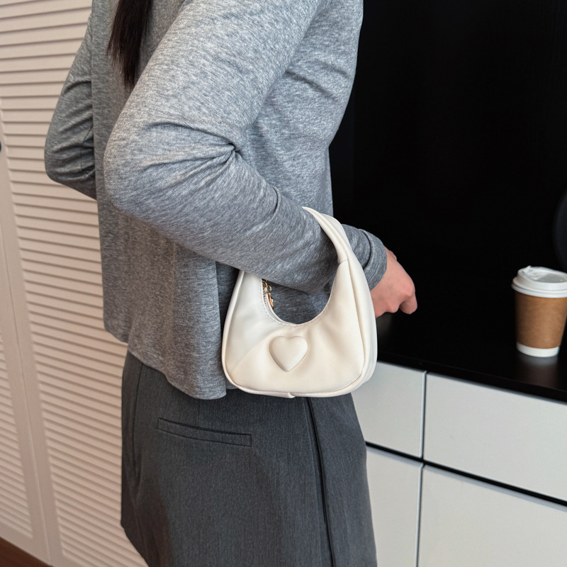 Bolso de amor de la princesa de aire exterior compacto mini bolso de cambio de moda de color sólido 2026 bolso de comercio exterior transfronterizo para niños