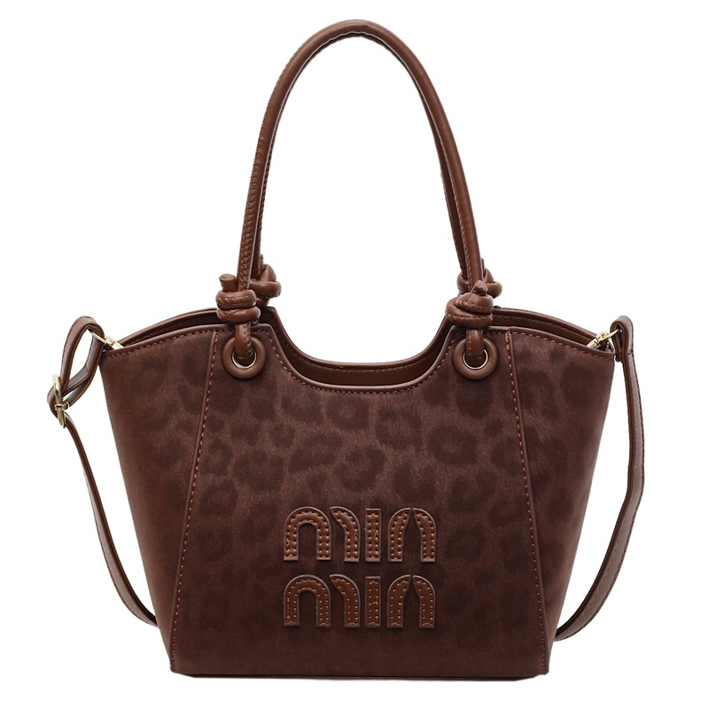Leopardo transfronterizo de gran capacidad bolso de cubo portátil para mujeres otoño y invierno 2025 nuevo estilo coreano bolso de hombro de moda bolso de mochila