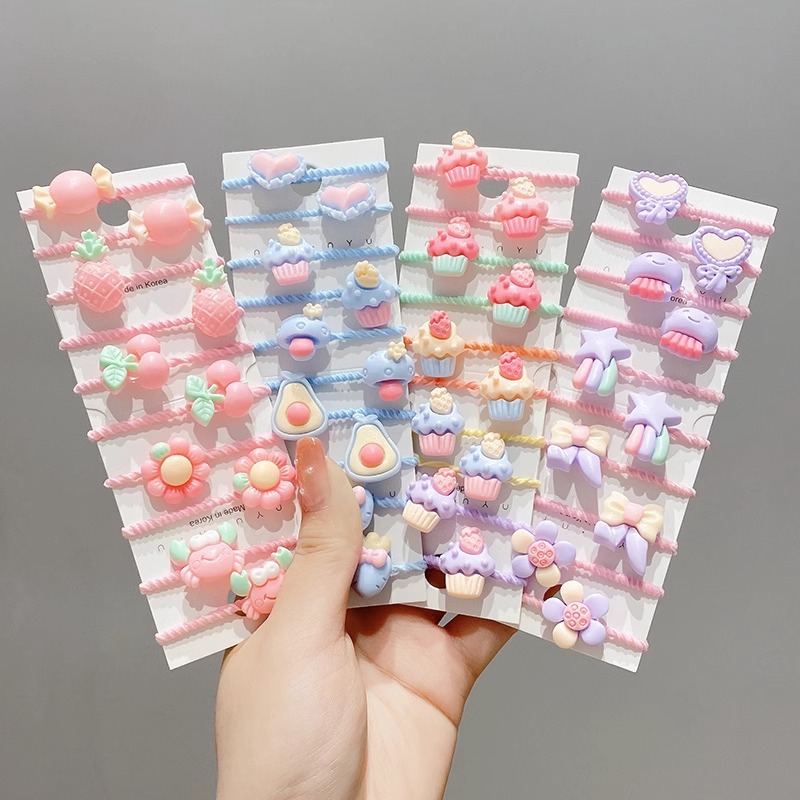 La cuerda del pelo del bebé de las muchachas de la banda de goma de los niños no lastima el pelo Los accesorios del pelo del pulgar del tamaño pequeño atan la banda de goma del pelo