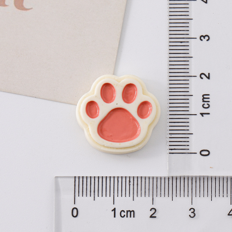 Dibujos animados transfronterizos garra de gato chocolate bricolaje accesorios de resina gel de crema accesorios para el cabello carcasa del teléfono móvil agujeros zapatos parche material