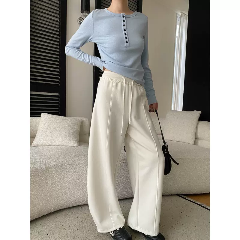 司南 早春新款 立裁中缝设计感抽绳松紧高腰弯刀阔腿卫裤 SN8583