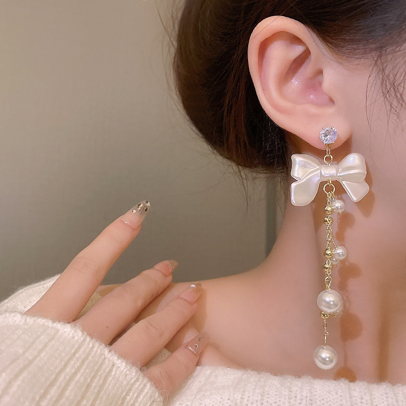 女性用の軽くて豪華なパールイヤリング、新しいニッチデザインのイヤリング、ロングリボンタッセルイヤリング、イヤリング|undefined