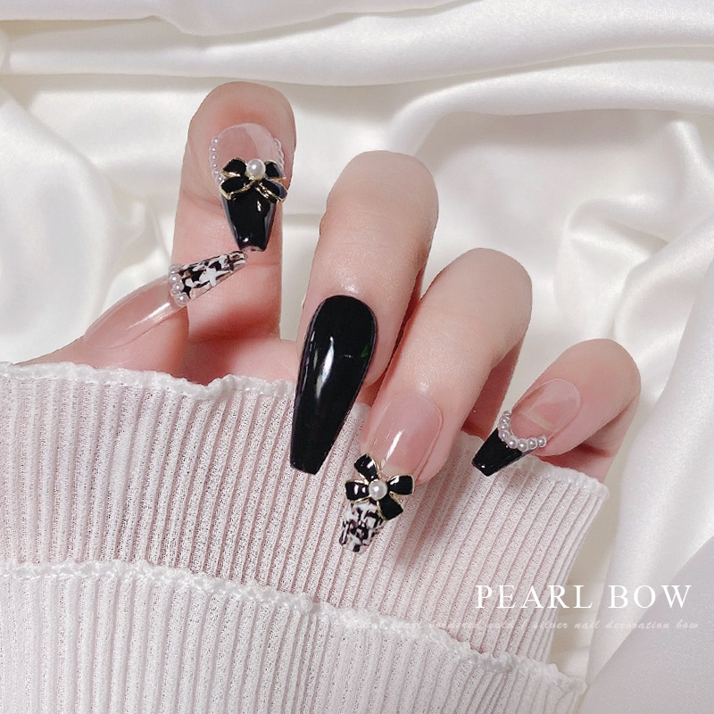 Arco de uñas joyería negro blanco Chanel estilo 2022 nuevo barroco perla clavo diamante neto popular