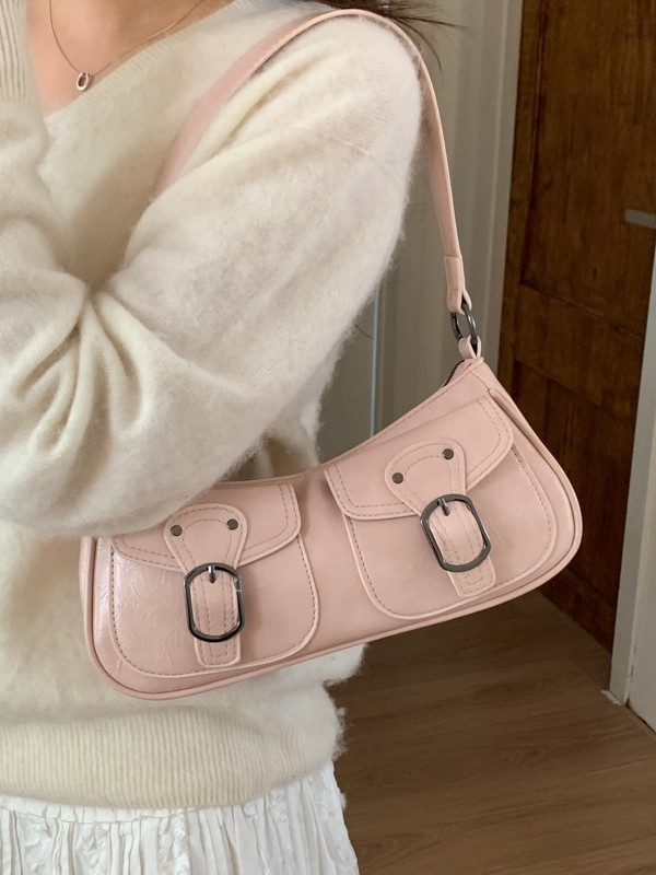 Retro versátil hombro explosivo nicho bolsos debajo de la axila mujeres 2026 ventas calientes nuevas lujosas de moda alta sensación de backpack