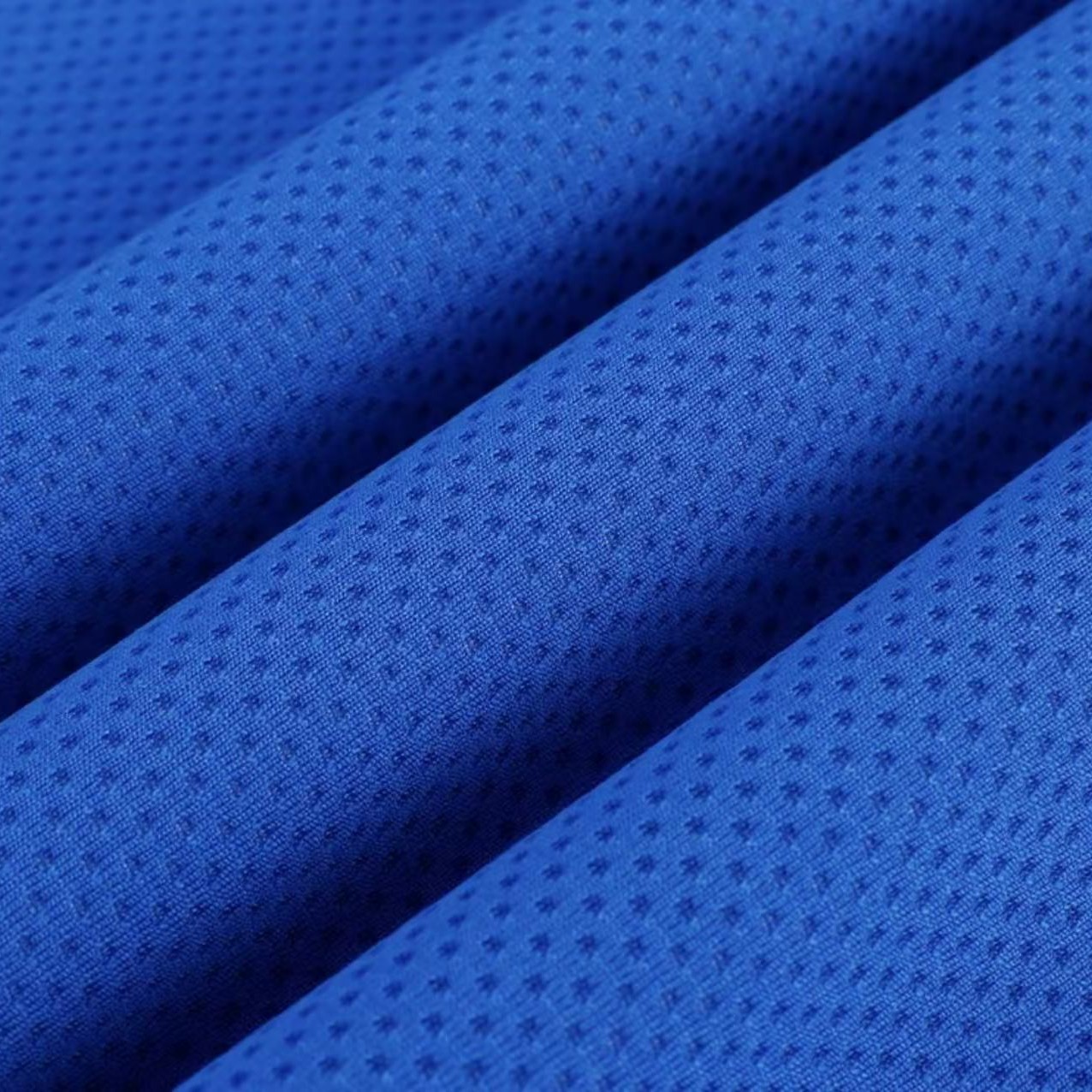 Spot Shuangyi.com Promoción especial poliéster absorbente de humedad rápida secado deportivo tela de malla Jacquard panal