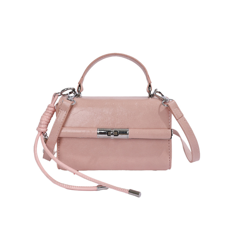 Bolsa de mano transfronteriza para mujeres 2026 nuevo bolso de hombro de verano de alta calidad retro bolso de mano de moda mochila