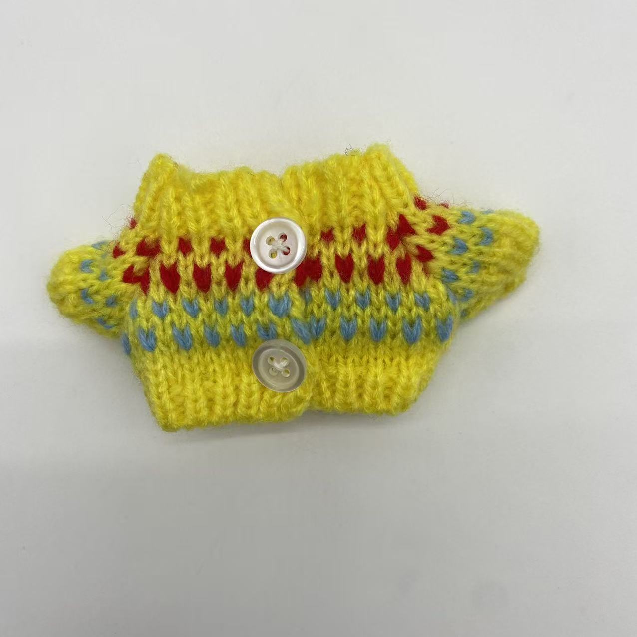 Yellow pattern two-button sweater