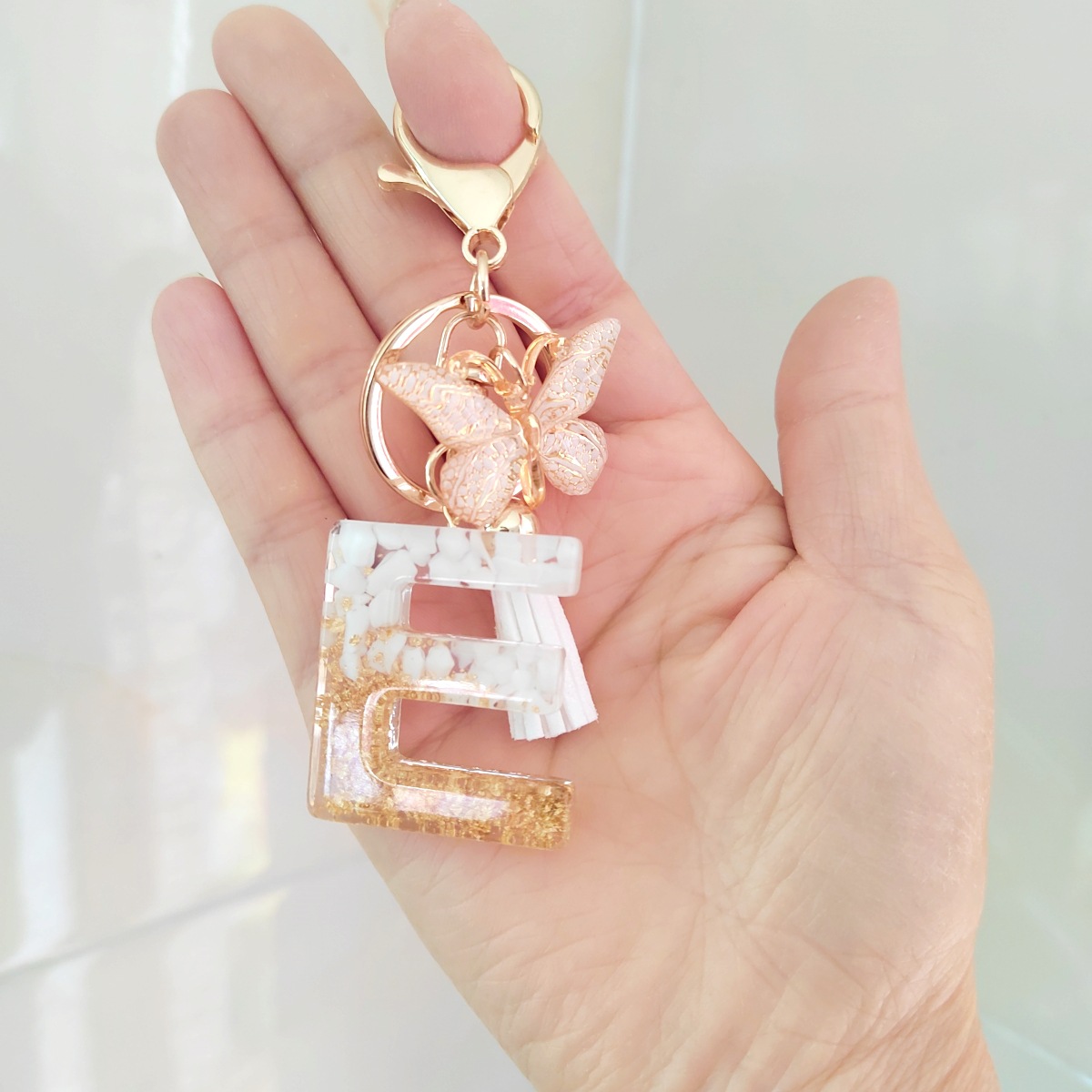 Venta caliente transfronteriza e-commerce carta llavero colgante europeo y americano moda joyería accesorios mariposa borla clave colgante