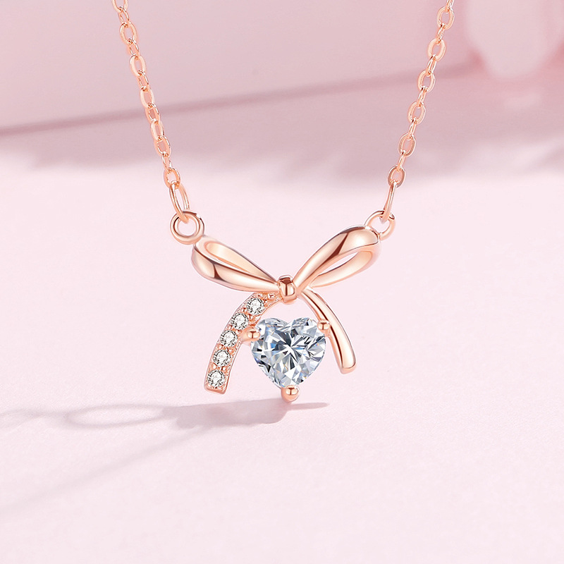 Estilo coreano S925 plata esterlina arco collar en forma de corazón de las mujeres de diamantes incrustados de alta calidad de moda red roja elegante cadena de clavícula simple