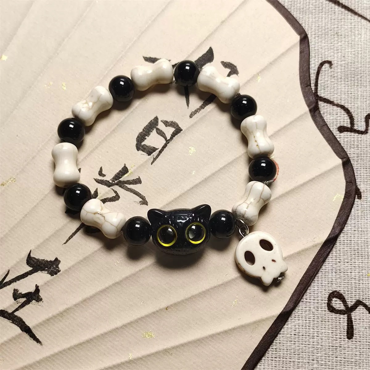 Esqueleto gato brazalete de cuerda trenzada nicho femenino diseño dulce y fresco chino ventanilla brazalete de color joyería