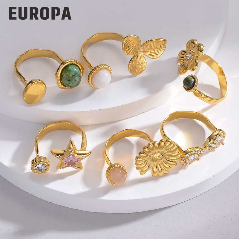 Diseño de nicho de alto grado flor ZIRCON anillo abierto luz femenina estilo de lujo europeo y americano elegante anillo ajustable de acero de titanio