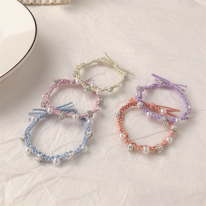 Cordón de cabeza mujer ligera de lujo temperamento torcido de alta elasticidad duradera cabello adulto atado banda de goma simple anillo de diamante