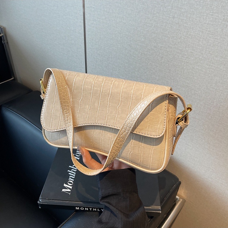 Bolso de hombro con hebilla magnética de nuevo estilo de alta calidad para viajar al trabajo, bolso de mujer simple de moda, bolso de axila, portátil diagonal