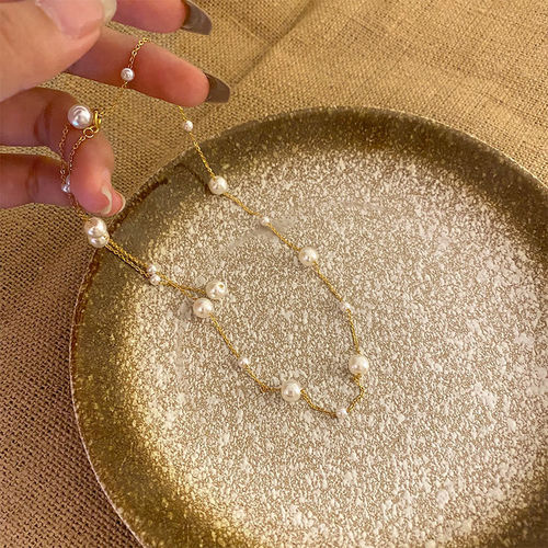 Elegant clavicle chain, small fresh titanium steel gypsophila pearl necklace, Japanese and Korean simple tassel versatile personalized necklace for women