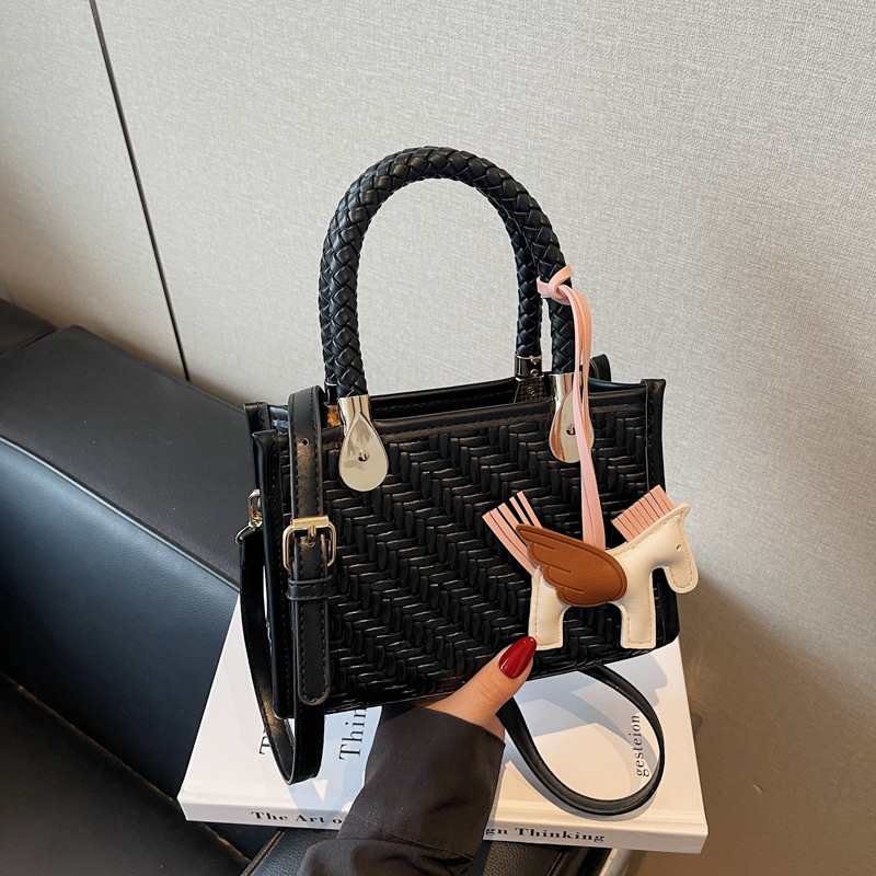 Bolso tejido más vendido de comercio exterior para mujer 2025 nuevo bolso de hombro de moda de color en contraste textura bolso cuadrado pequeño de mensajero de todo fósforo