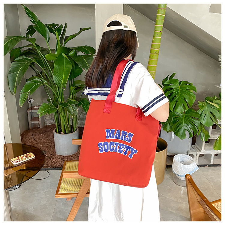 Canvas bag for women, single shoulder, ins crossbody, laid-back style, college student class bag, artistic Japanese style, large capacity, Hong Kong style, chic undefined