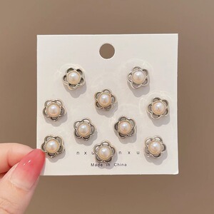 Pantalones de jeans de cintura, botones de cintura ajustados, botones ajustables fijos