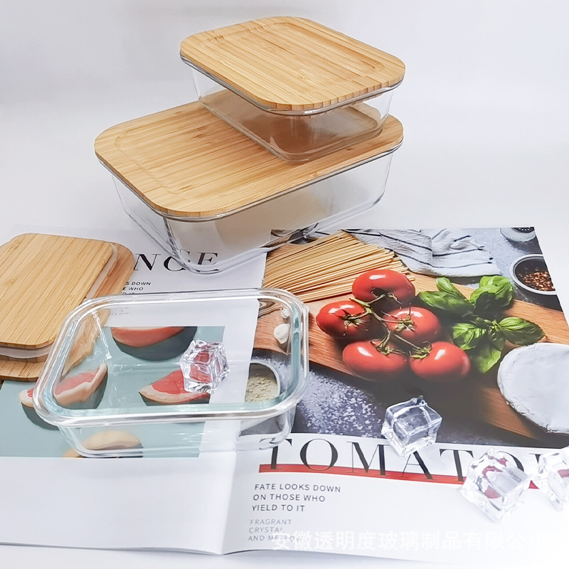 La lonchera de vidrio con cubierta de bambú y madera ecológica se puede calentar en el horno microondas, la caja de conservación congelada, el tazón de bento, la caja de comedor sellada con la tapa