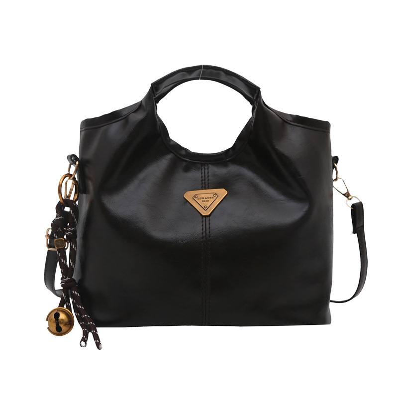 Bolso de mano retrógrado nicho mujer 2025 nuevo estilo de piel de cera de aceite para viajar bolso de hombro de gran capacidad relajado mochila